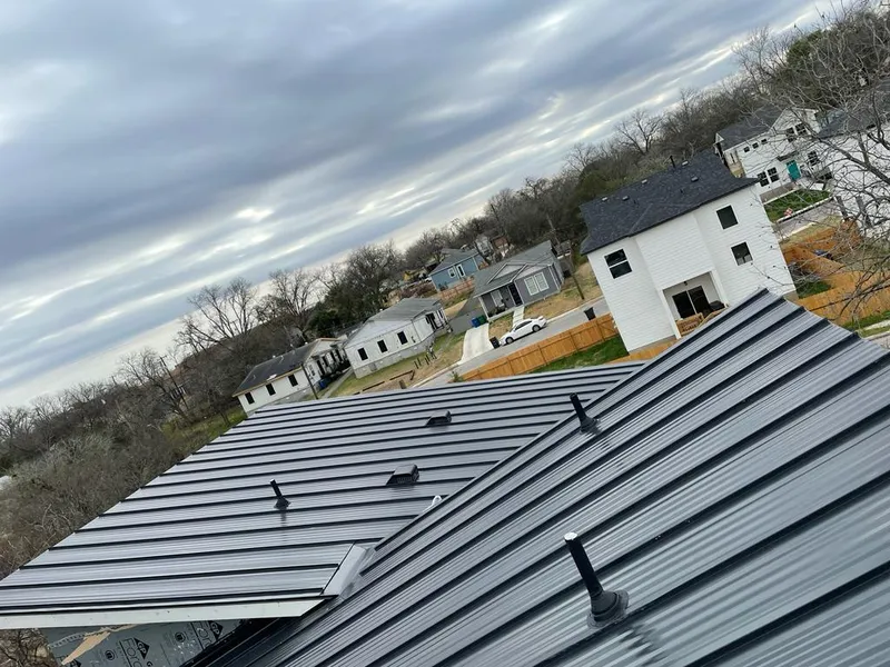 Standing seam metal roof panels with vents for Skylight Repair in North Alamo